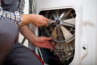 Man fixing dryer